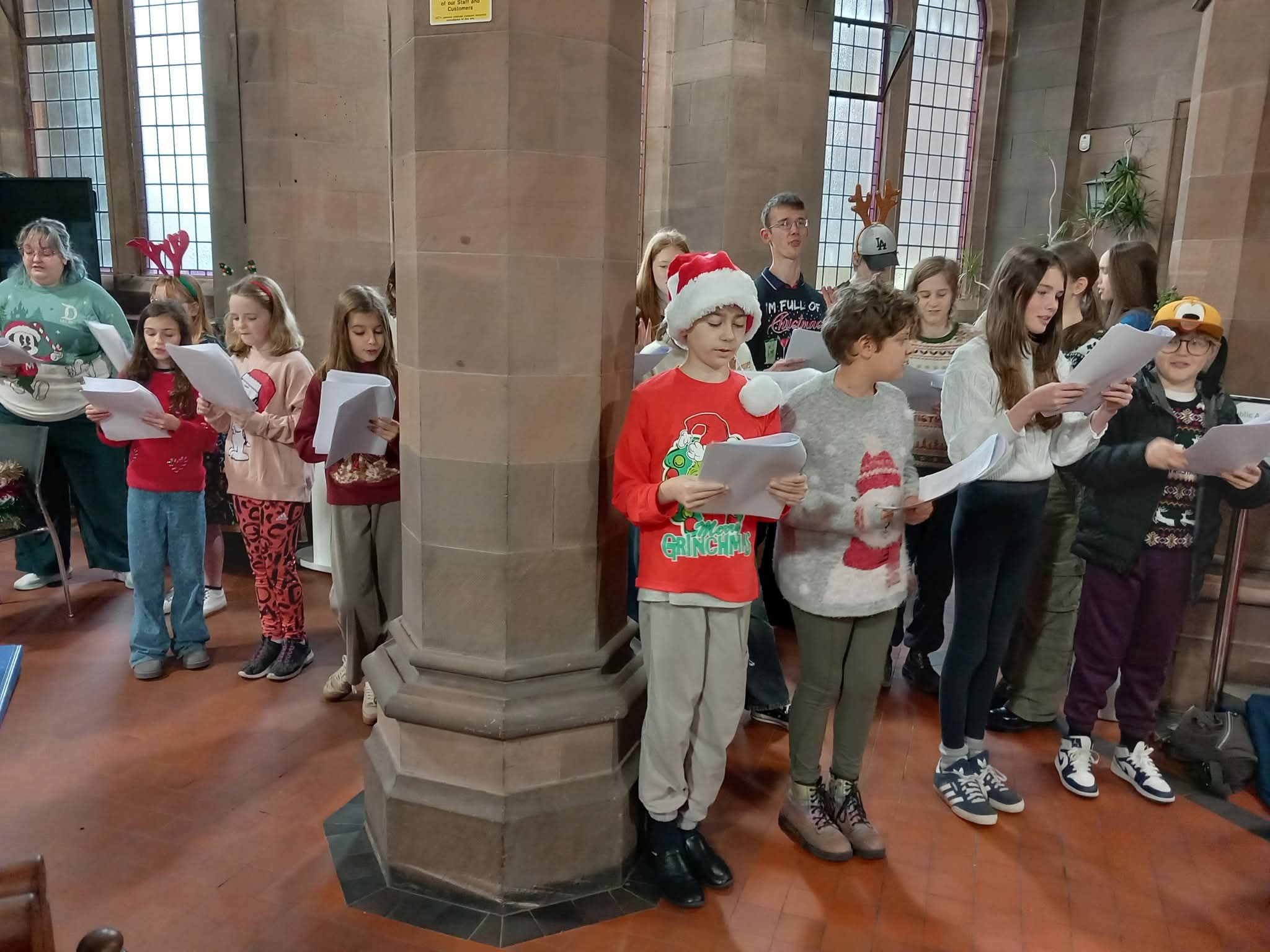 Furness Youth Theatre children singing carols at Barrow Town Hall